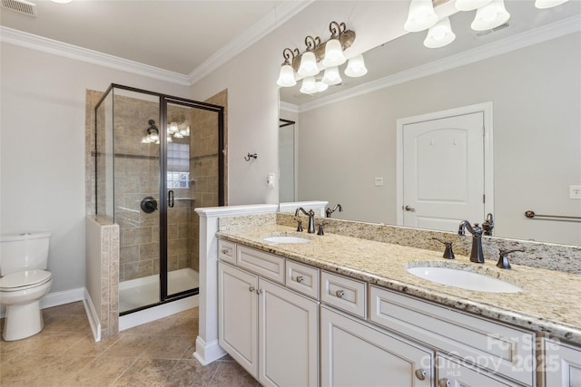 bathroom featuring a shower with door, vanity, crown molding, and toilet