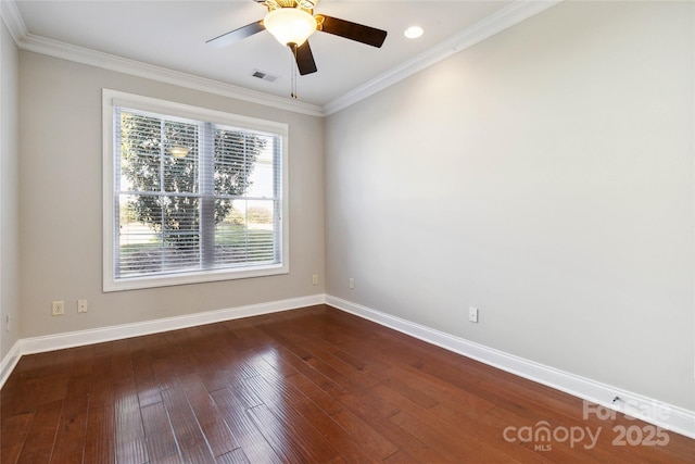 spare room featuring ornamental molding, dark hardwood / wood-style floors, and ceiling fan