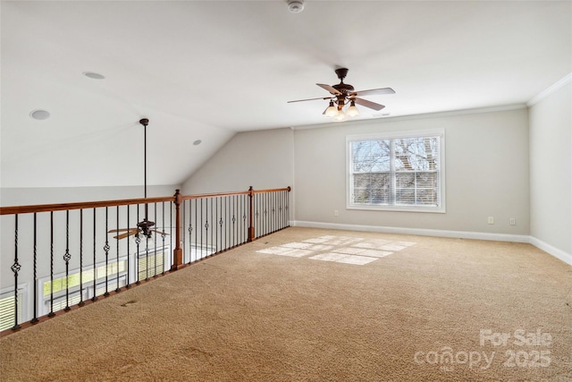 additional living space with vaulted ceiling, carpet flooring, and ceiling fan