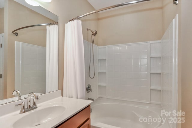 bathroom featuring vanity and shower / bath combination with curtain