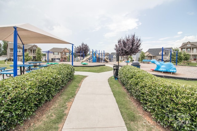 view of home's community featuring a playground