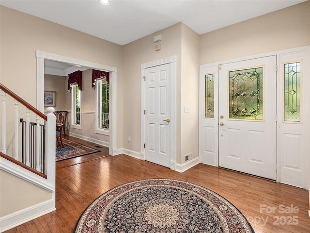 entryway with wood-type flooring