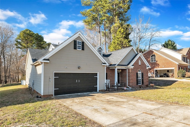 front facade with a garage and a front yard