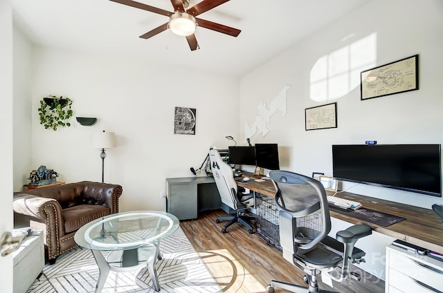 office area with wood-type flooring and ceiling fan