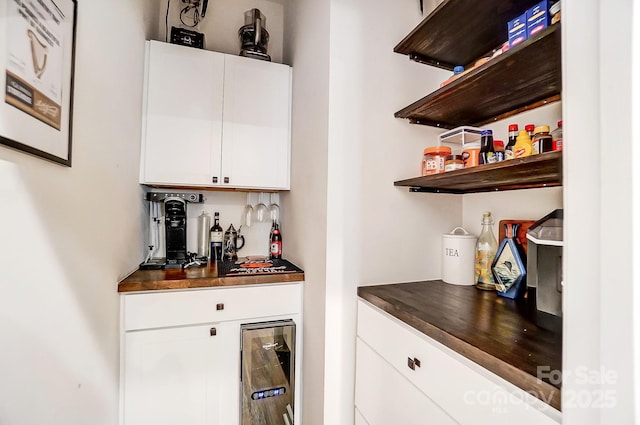 bar with white cabinetry