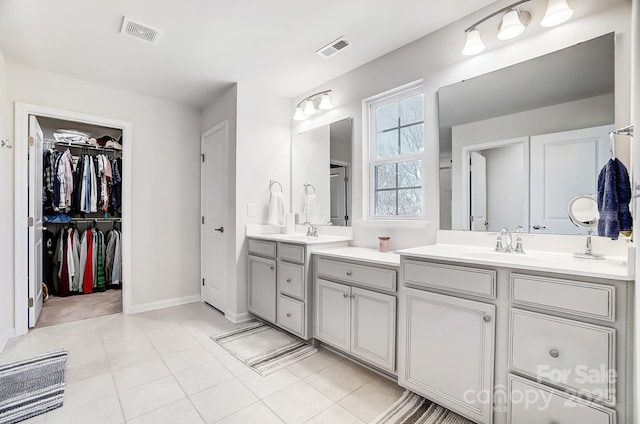 bathroom featuring vanity and tile patterned floors