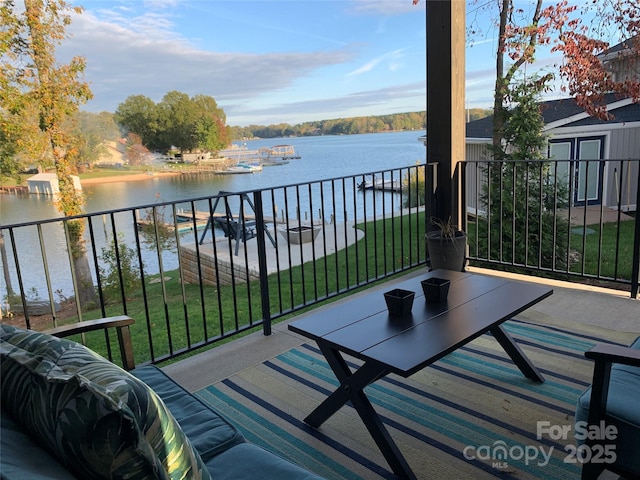 balcony featuring a water view