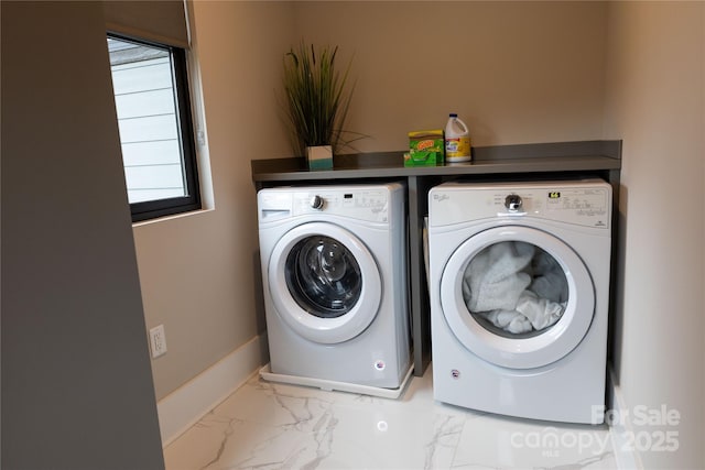 laundry area featuring independent washer and dryer