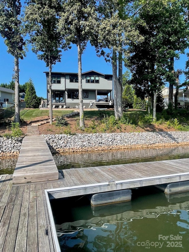 view of dock with a water view