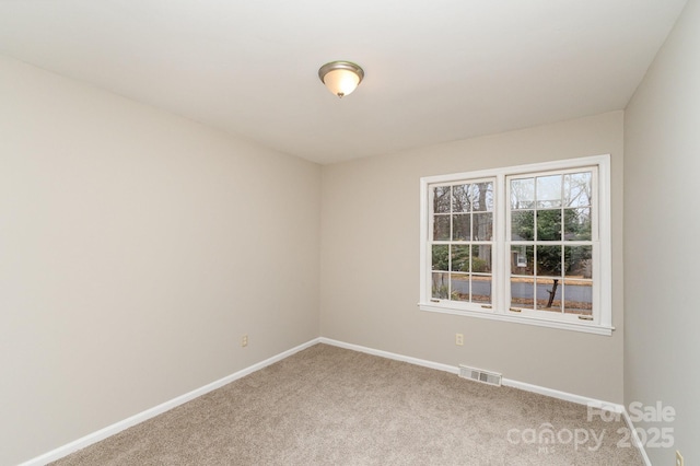 view of carpeted spare room