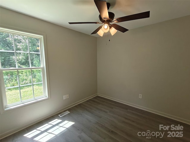 629 S Caldwell St, Salisbury, NC 28144 - unfurnished room featuring dark wood-style floors and ceiling fan