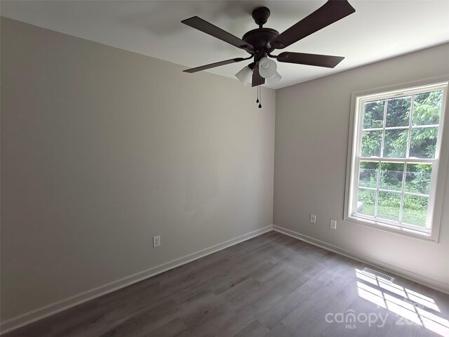 629 S Caldwell St, Salisbury, NC 28144 - spare room featuring dark wood finished floors and ceiling fan