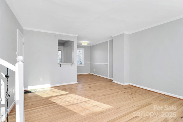 unfurnished living room with light hardwood / wood-style flooring and ornamental molding