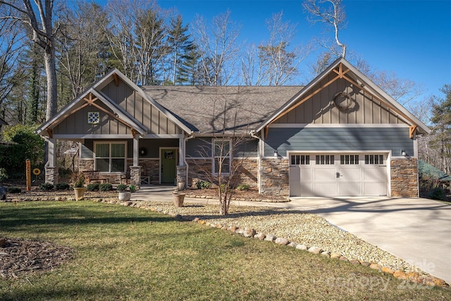 craftsman inspired home with a porch, a garage, and a front yard