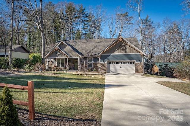 craftsman-style house featuring a garage and a front lawn