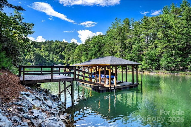 view of dock with a water view