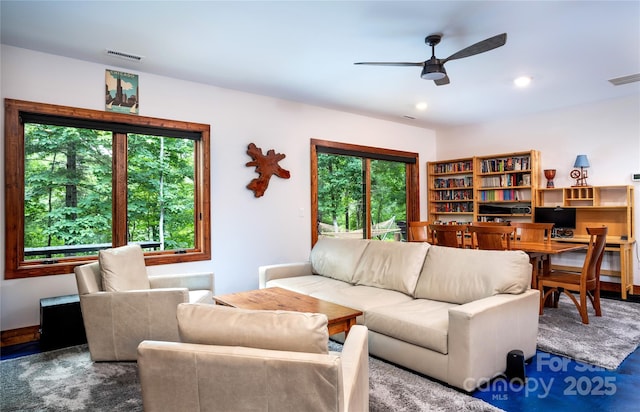 living room with ceiling fan