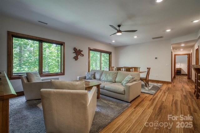2126 Sycamore Dr, Nebo, NC 28761 - living area featuring a ceiling fan, wood finished floors, recessed lighting, and baseboards