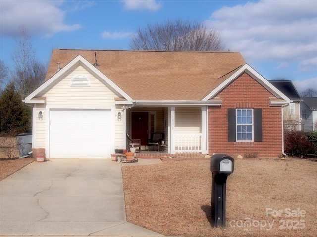 ranch-style house with a porch and a garage