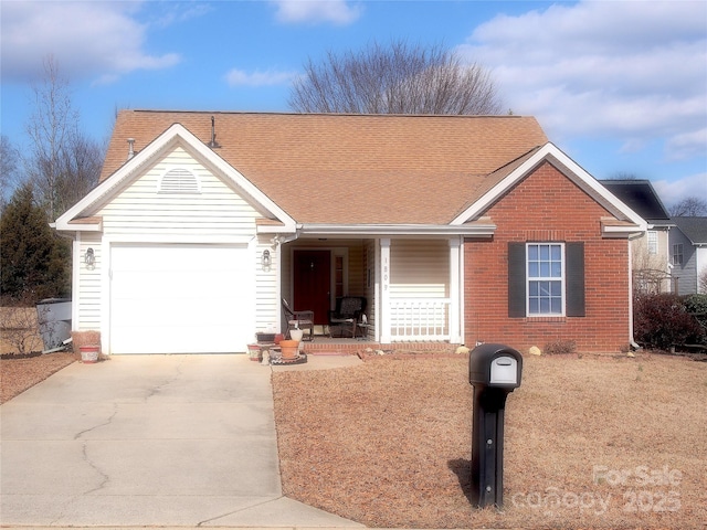 single story home featuring a garage and covered porch