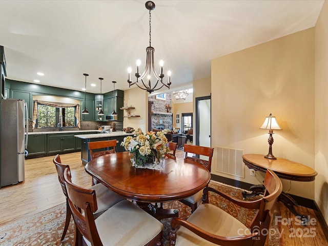 dining area with light wood-type flooring