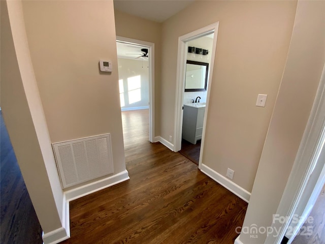 hall featuring dark hardwood / wood-style flooring