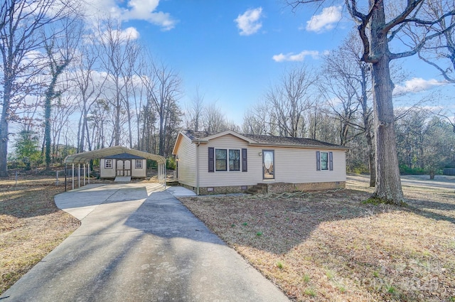 view of front of home featuring a carport