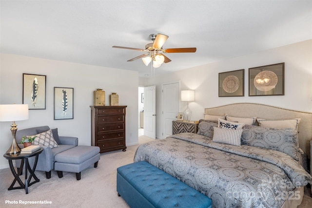 carpeted bedroom featuring ceiling fan