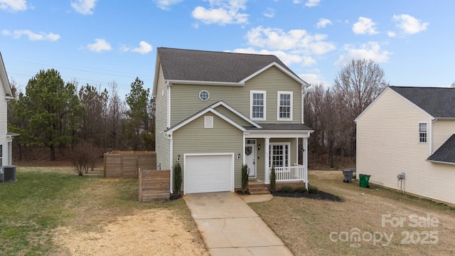 front facade with a garage and a front lawn