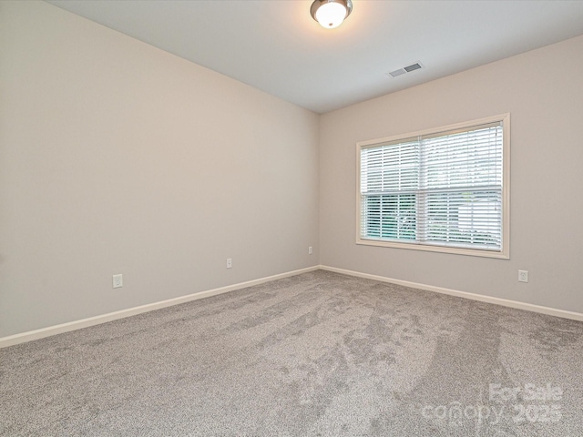 empty room with carpet floors