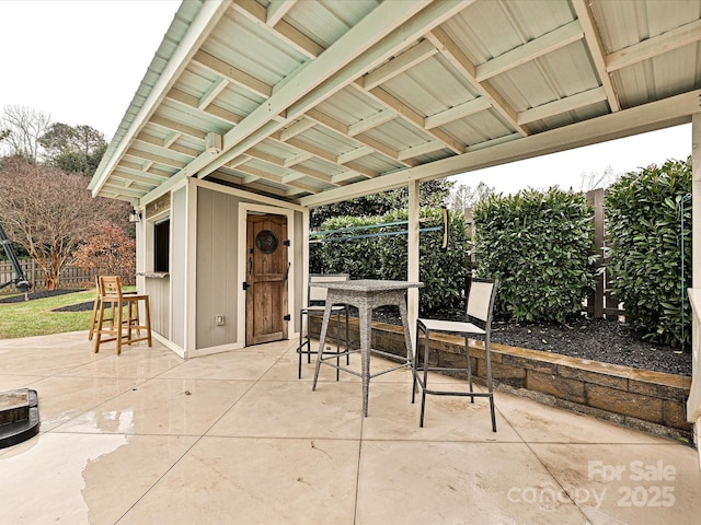 view of patio / terrace featuring a bar