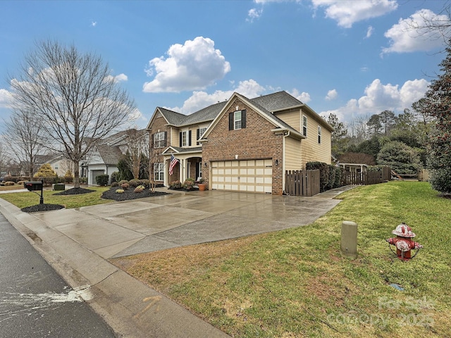 front of property with a garage and a front lawn