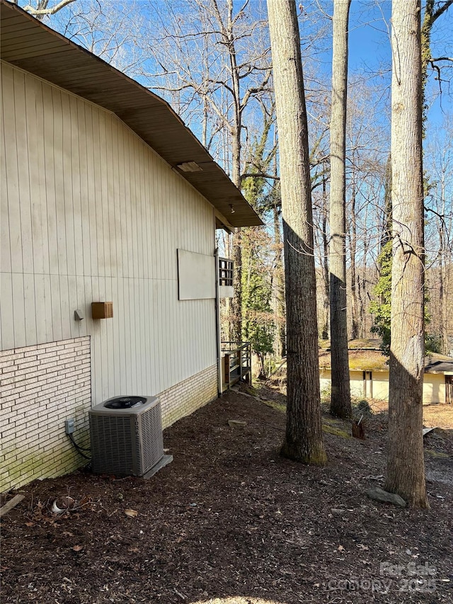 view of property exterior with central air condition unit