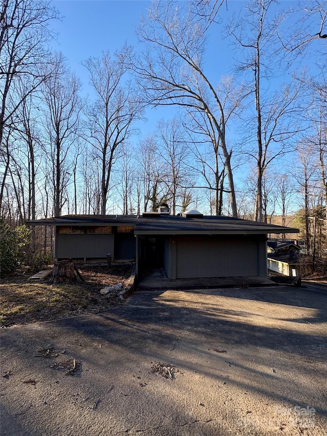 view of front of house with a carport