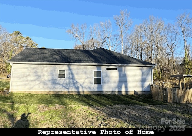 view of home's exterior featuring a lawn