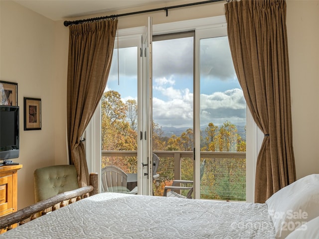 bedroom featuring multiple windows