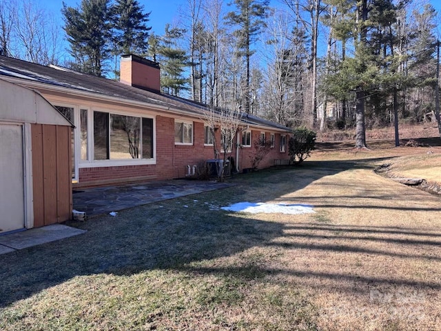 exterior space featuring a lawn