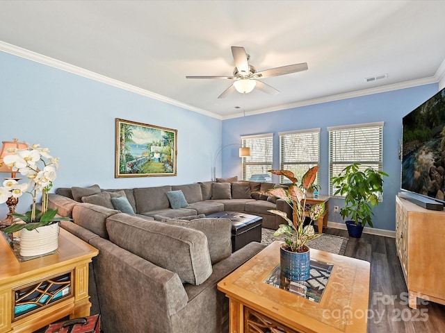 living room with dark hardwood / wood-style flooring, ornamental molding, and ceiling fan