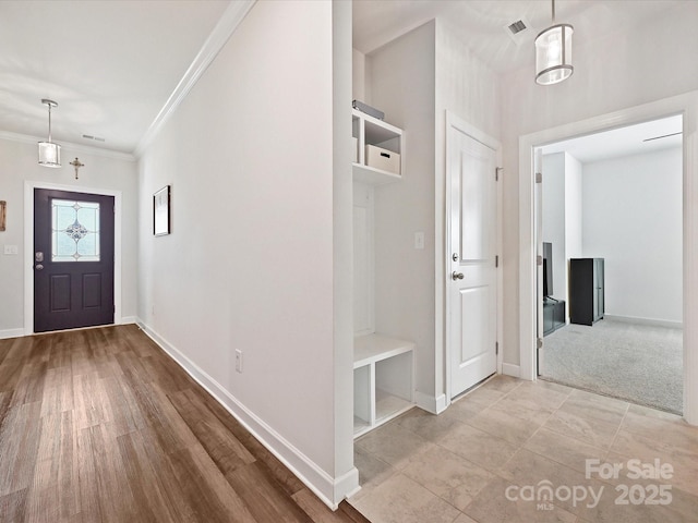 foyer with ornamental molding