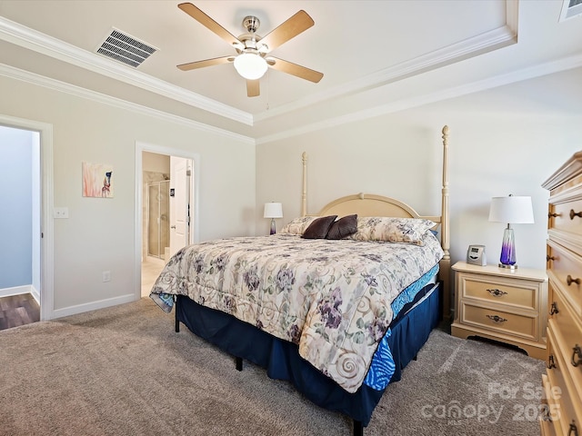 bedroom featuring carpet flooring, crown molding, baseboards, and visible vents