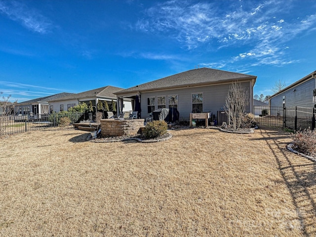 back of house featuring a patio, central air condition unit, a fenced backyard, and roof with shingles