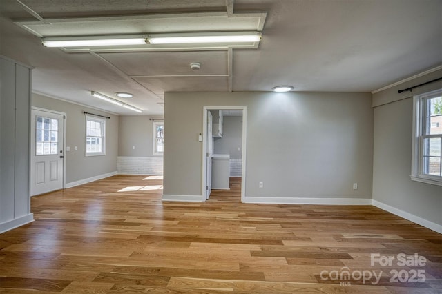 empty room with light wood-type flooring