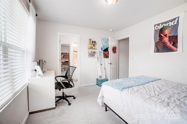 bedroom featuring light colored carpet