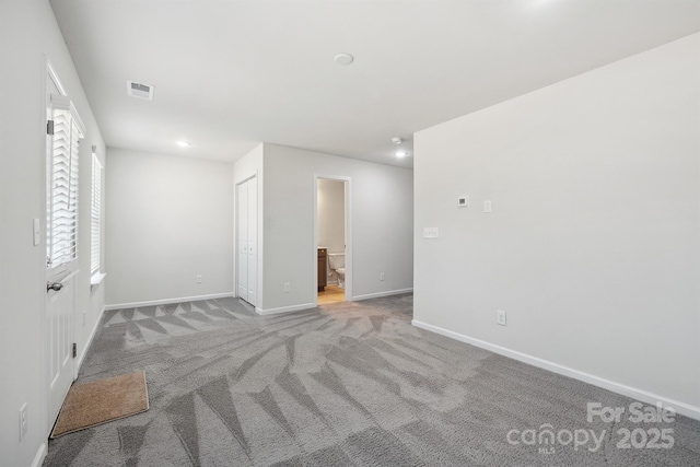 view of carpeted spare room