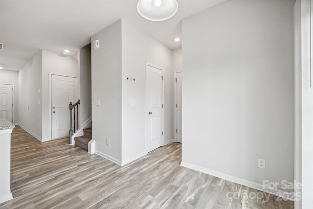 unfurnished room featuring light wood-type flooring