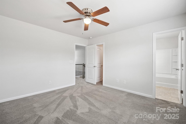 unfurnished bedroom with connected bathroom, light colored carpet, and ceiling fan