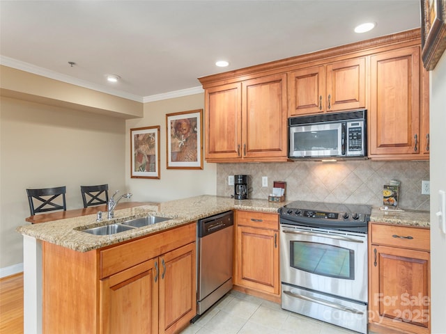 330 Bowling Park Rd, Asheville, NC 28803 - kitchen featuring sink, ornamental molding, stainless steel appliances, and kitchen peninsula