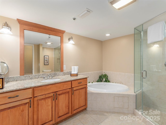 330 Bowling Park Rd, Asheville, NC 28803 - bathroom with vanity, tile patterned floors, and independent shower and bath