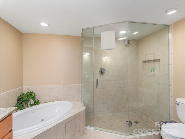 330 Bowling Park Rd, Asheville, NC 28803 - full bathroom featuring vanity, toilet, and separate shower and tub