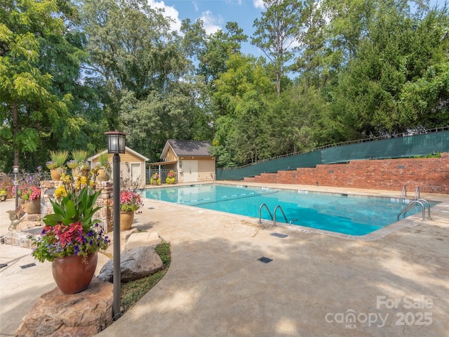 330 Bowling Park Rd, Asheville, NC 28803 - view of swimming pool with a patio area and a storage unit